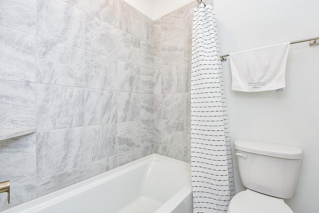 full bathroom featuring toilet and shower / tub combo