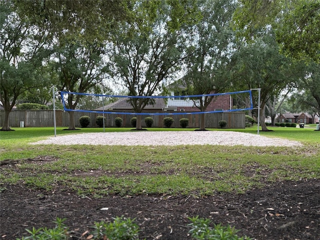 3631 Belmont Shore Ln, Missouri City, TX 77459 - back of house featuring volleyball court and brick siding