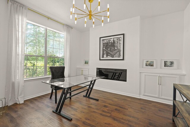 3631 Belmont Shore Ln, Missouri City, TX 77459 - office area featuring wood finished floors, a chandelier, and baseboards