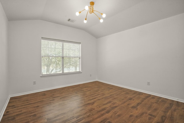 3631 Belmont Shore Ln, Missouri City, TX 77459 - empty room with vaulted ceiling, a chandelier, dark wood-type flooring, and baseboards