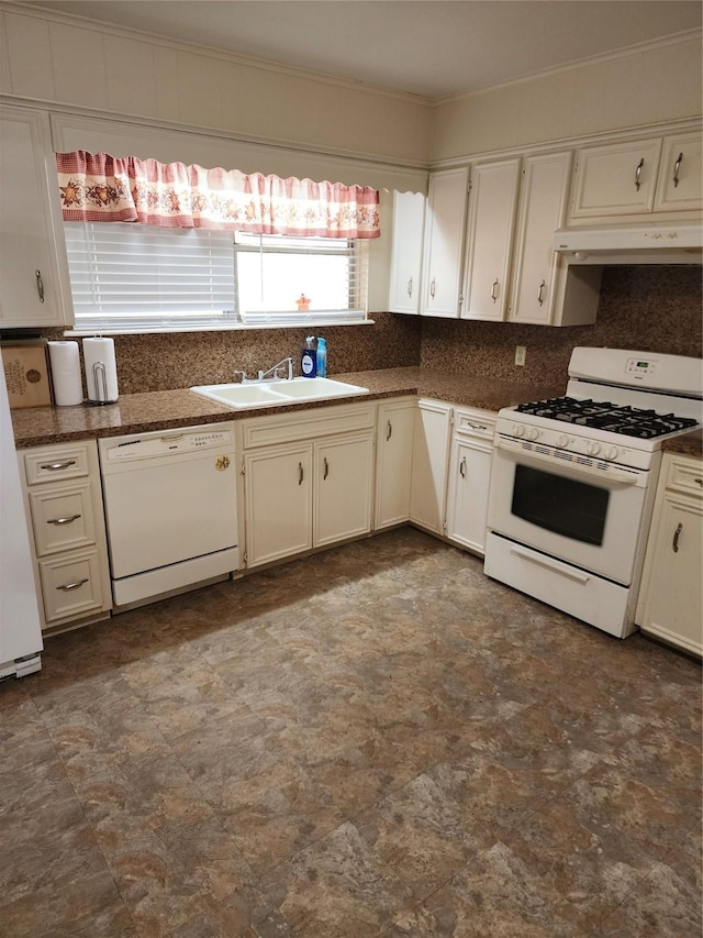 918 Redondo Dr, Houston, TX 77015 - kitchen featuring white appliances, a sink, under cabinet range hood, dark countertops, and decorative backsplash
