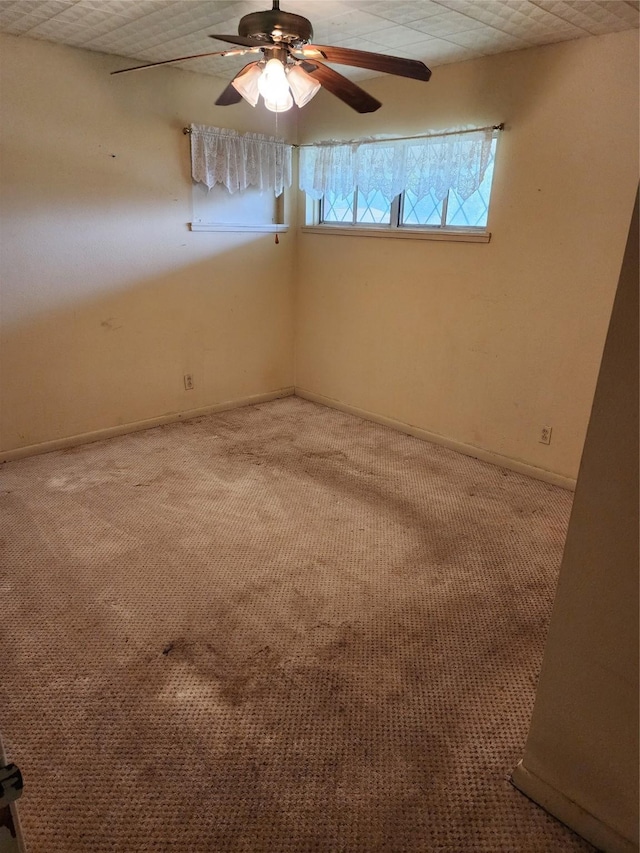 918 Redondo Dr, Houston, TX 77015 - carpeted empty room featuring ceiling fan and baseboards