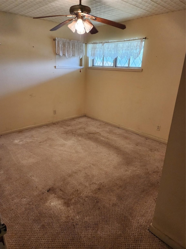 918 Redondo Dr, Houston, TX 77015 - spare room with carpet flooring, a ceiling fan, and baseboards