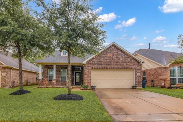 ranch-style house with driveway, a shingled roof, a front yard, an attached garage, and brick siding