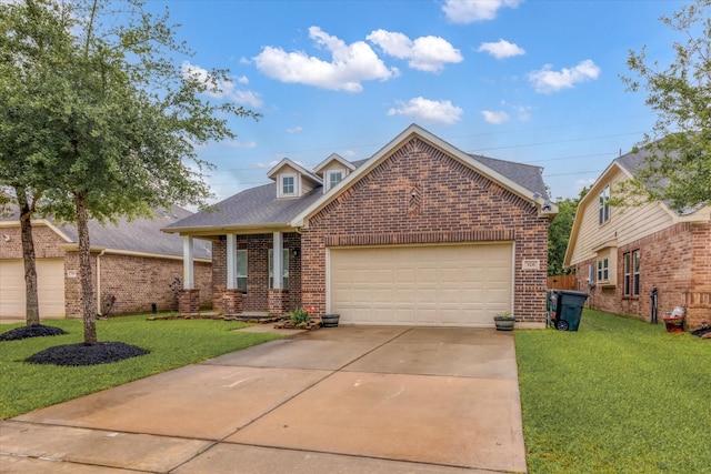 view of front of house with a front lawn, a shingled roof, concrete driveway, and brick siding