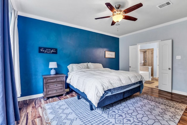 bedroom with a ceiling fan, visible vents, baseboards, ornamental molding, and wood finished floors