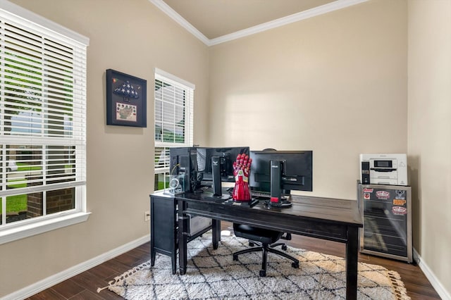 office featuring ornamental molding, wood finished floors, and baseboards