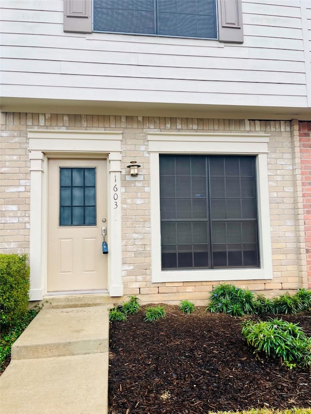 2910 Grants Lake Blvd Unit 1603, Sugar Land, TX 77479 - doorway to property with brick siding