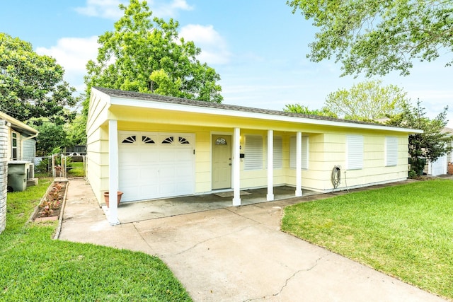 ranch-style house featuring concrete driveway, a front lawn, and a garage