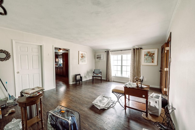 5514 Pardee St, Houston, TX 77026 - living room featuring a ceiling fan, baseboards, a wall mounted AC, and wood finished floors