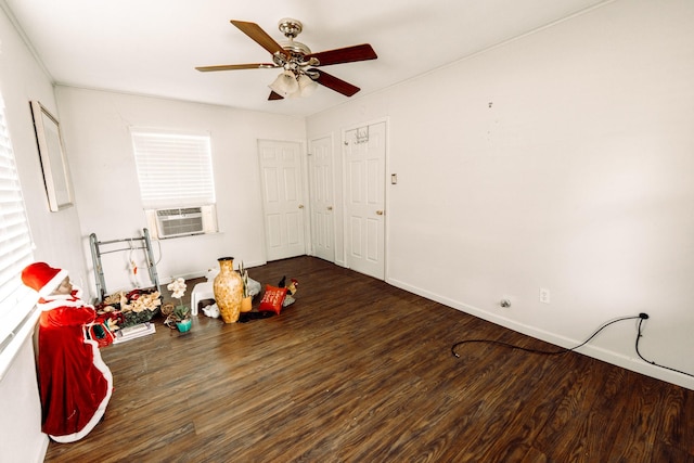 5514 Pardee St, Houston, TX 77026 - bedroom featuring a ceiling fan, baseboards, and wood finished floors