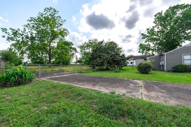 5514 Pardee St, Houston, TX 77026 - view of road featuring a gate and driveway