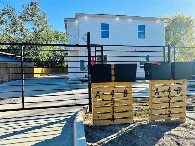 view of gate featuring fence