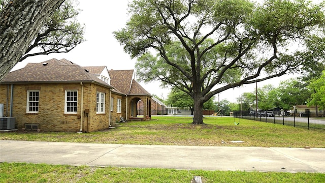 266 Monroe St, Giddings, TX 78942 - view of yard with central AC