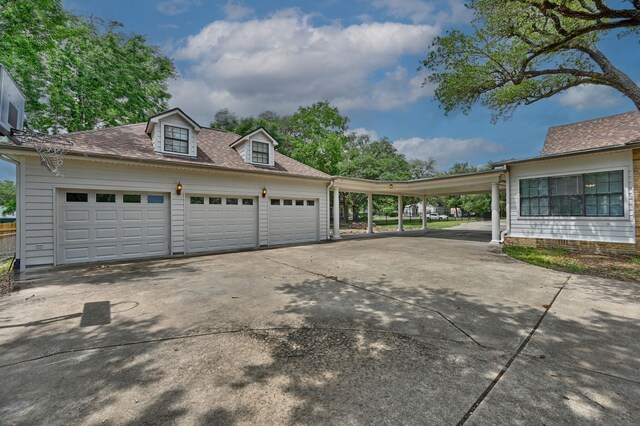 266 Monroe St, Giddings, TX 78942 - view of property exterior featuring concrete driveway