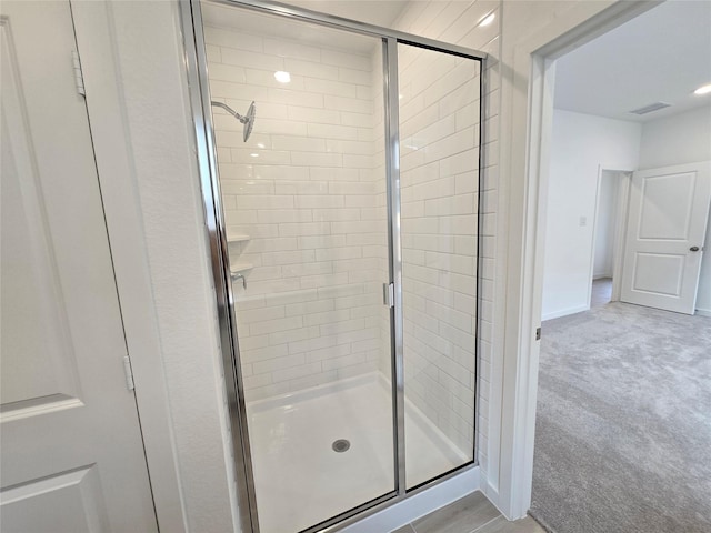 1083 Blue Stone Dr, Beasley, TX 77417 - bathroom featuring visible vents, a shower stall, and baseboards