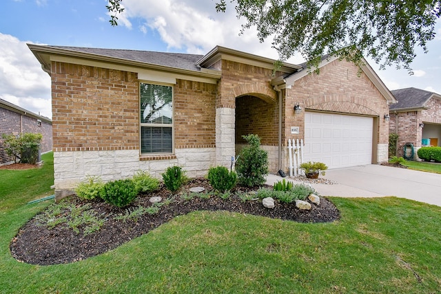 view of front of house featuring concrete driveway, an attached garage, brick siding, and a front yard