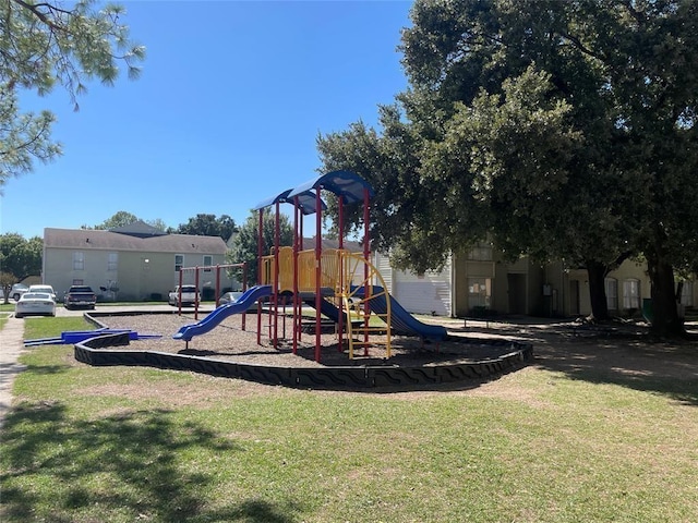 community playground featuring a yard