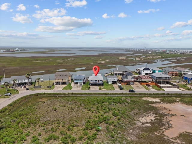 517 Swordfish Ln, Surfside Beach, TX 77541 - aerial perspective of suburban area featuring a large body of water