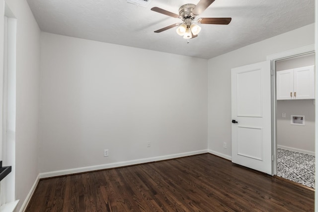 unfurnished bedroom with baseboards, ceiling fan, and dark wood-style flooring