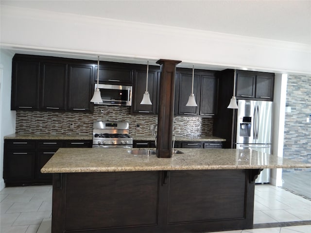 kitchen featuring tasteful backsplash, stainless steel appliances, light tile patterned flooring, and a sink