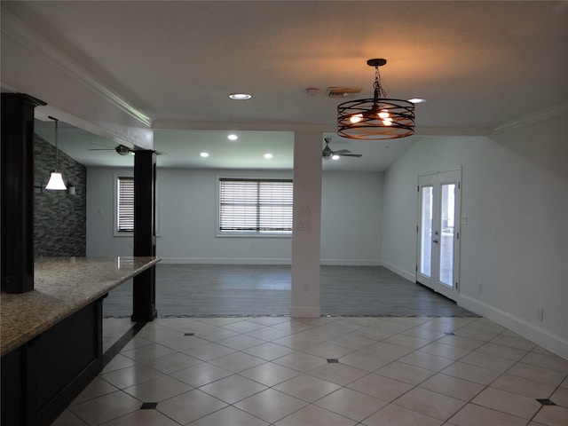interior space with recessed lighting, light tile patterned flooring, baseboards, and ceiling fan with notable chandelier