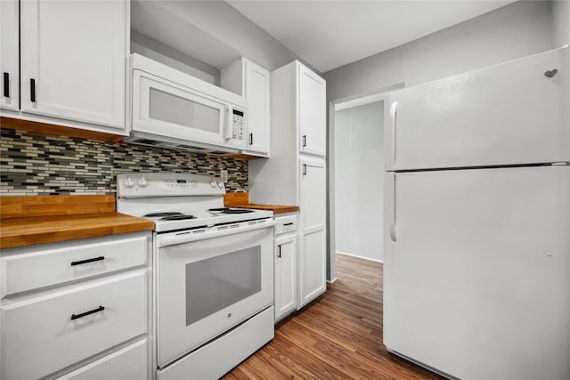 kitchen with tasteful backsplash, white cabinets, butcher block countertops, light wood-type flooring, and white appliances