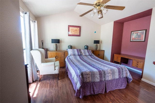 bedroom with baseboards, wood finished floors, ceiling fan, and vaulted ceiling