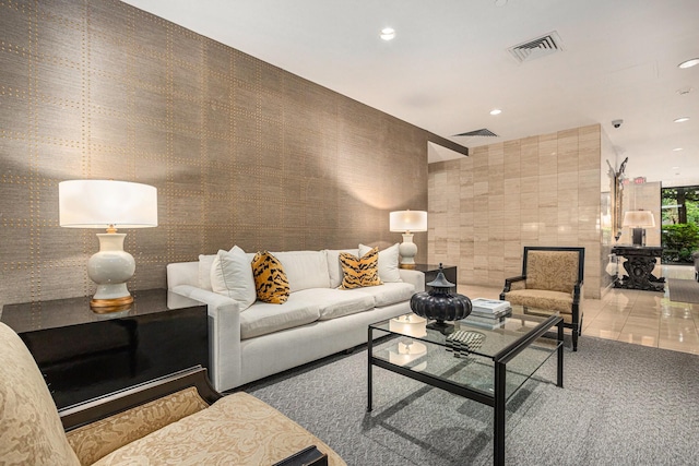 living area with visible vents and recessed lighting