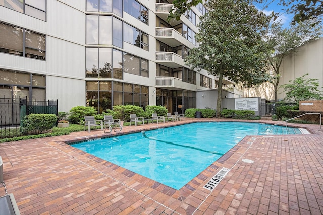 pool featuring fence
