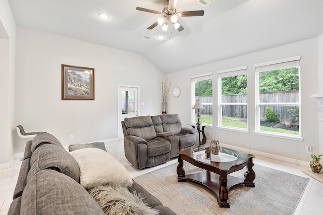 living room featuring visible vents, a healthy amount of sunlight, lofted ceiling, and ceiling fan