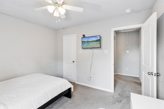 bedroom featuring attic access, ceiling fan, carpet floors, and baseboards