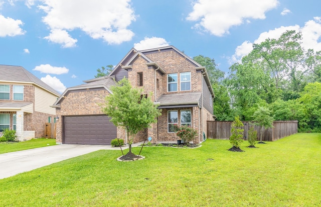 traditional home with a front lawn, fence, driveway, and brick siding