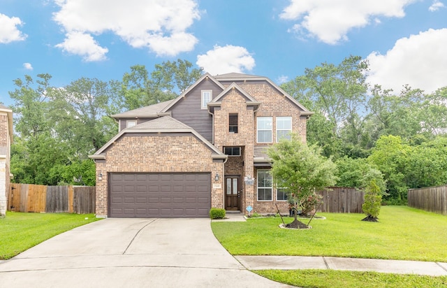 view of front of property with a front lawn, a garage, brick siding, concrete driveway, and fence