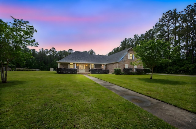 4145 Fm 770th Rd, Kountze, TX 77625 - view of front of property with a front lawn and brick siding