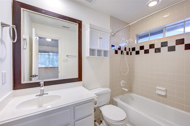 full bath with shower / bath combination, visible vents, toilet, and a wealth of natural light