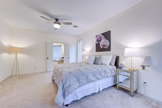 bedroom with visible vents, crown molding, and light carpet
