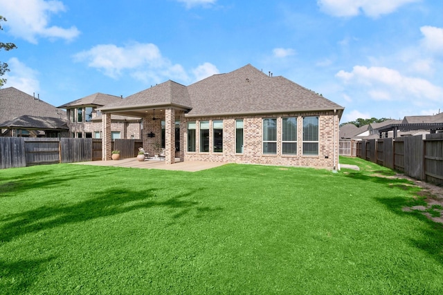 16711 Arboleda Dr, Humble, TX 77346 - rear view of house featuring brick siding, a patio, and roof with shingles