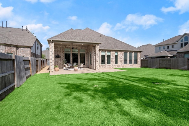 16711 Arboleda Dr, Humble, TX 77346 - back of house with brick siding, a patio, a shingled roof, and a ceiling fan