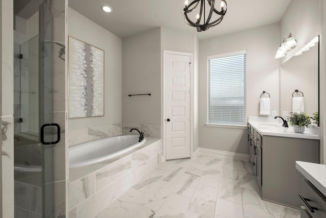 16711 Arboleda Dr, Humble, TX 77346 - bathroom with vanity, a chandelier, a bath, a shower stall, and marble finish floors