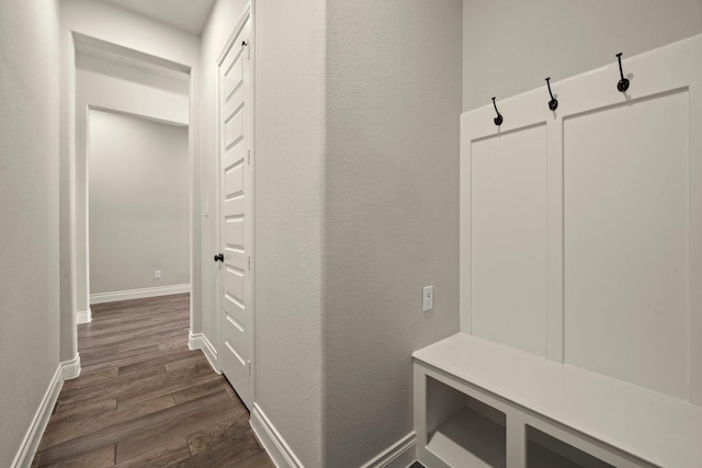 16711 Arboleda Dr, Humble, TX 77346 - mudroom featuring dark wood-type flooring and baseboards