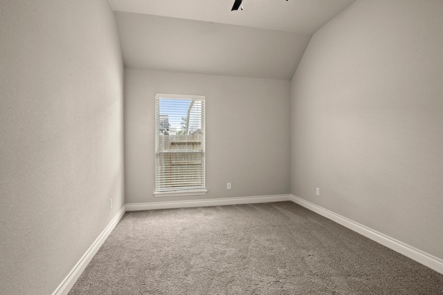 16711 Arboleda Dr, Humble, TX 77346 - unfurnished room featuring vaulted ceiling, carpet flooring, baseboards, and ceiling fan