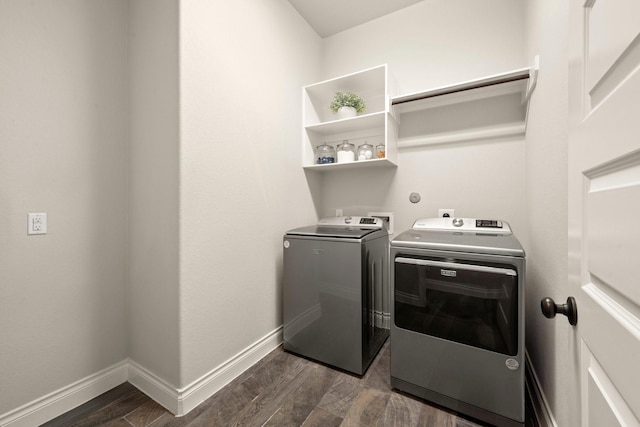 16711 Arboleda Dr, Humble, TX 77346 - laundry area with washing machine and clothes dryer, dark wood-style floors, and baseboards