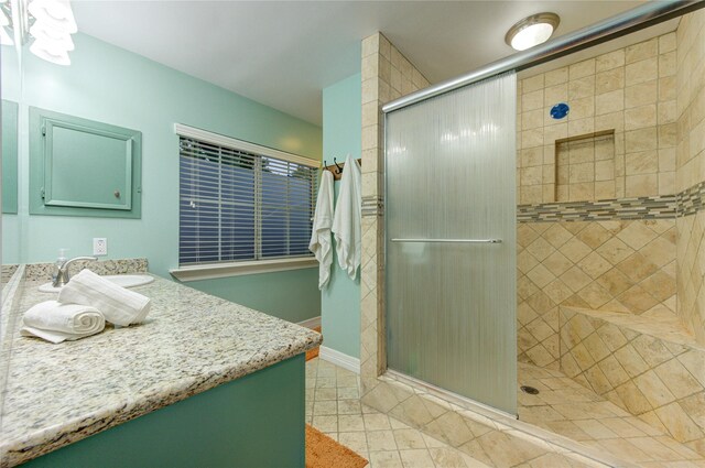 11815 Poplar Creek Dr, Houston, TX 77077 - full bath with vanity, tile patterned flooring, and a stall shower