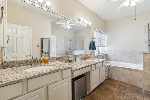13907 Carrington Ln, Cypress, TX 77429 - full bathroom featuring a ceiling fan, a shower stall, double vanity, and a bath