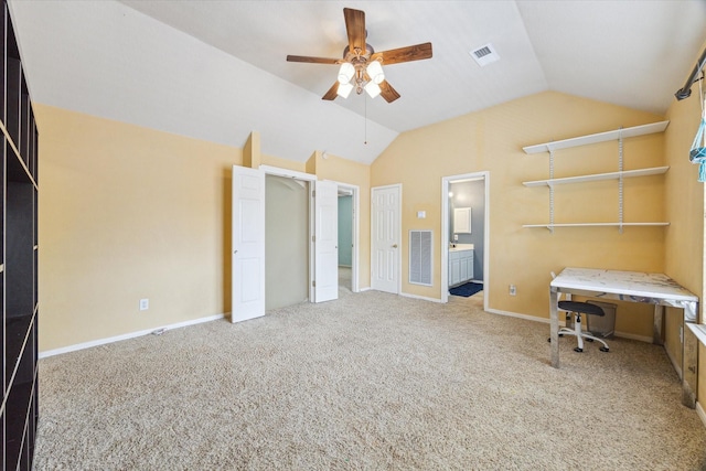 13907 Carrington Ln, Cypress, TX 77429 - unfurnished bedroom with vaulted ceiling, carpet flooring, ensuite bathroom, a desk, and a ceiling fan