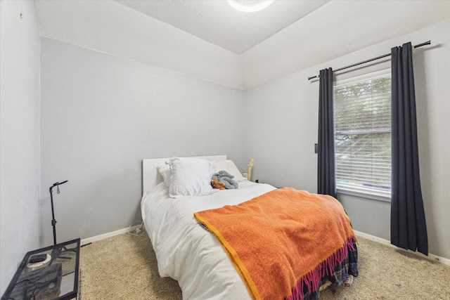 13907 Carrington Ln, Cypress, TX 77429 - bedroom with light carpet, baseboards, and vaulted ceiling