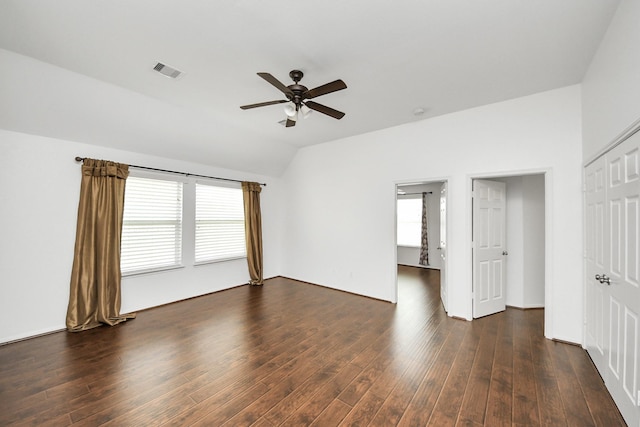 interior space featuring visible vents, plenty of natural light, a ceiling fan, and vaulted ceiling