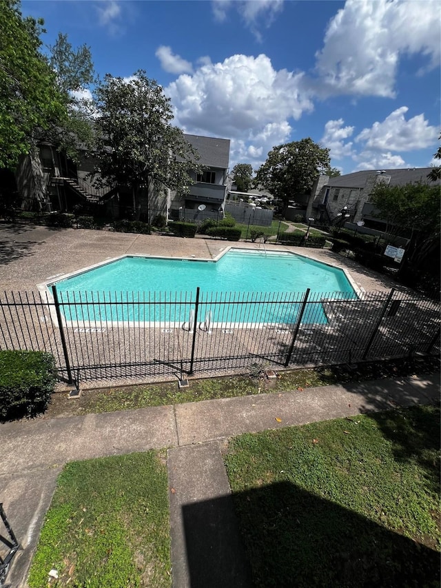 pool featuring fence