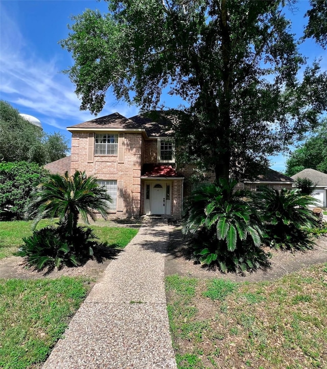 16418 York Minster Dr, Spring, TX 77379 - traditional home with brick siding and driveway